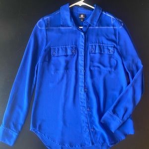 Bright blue button down shear shirt